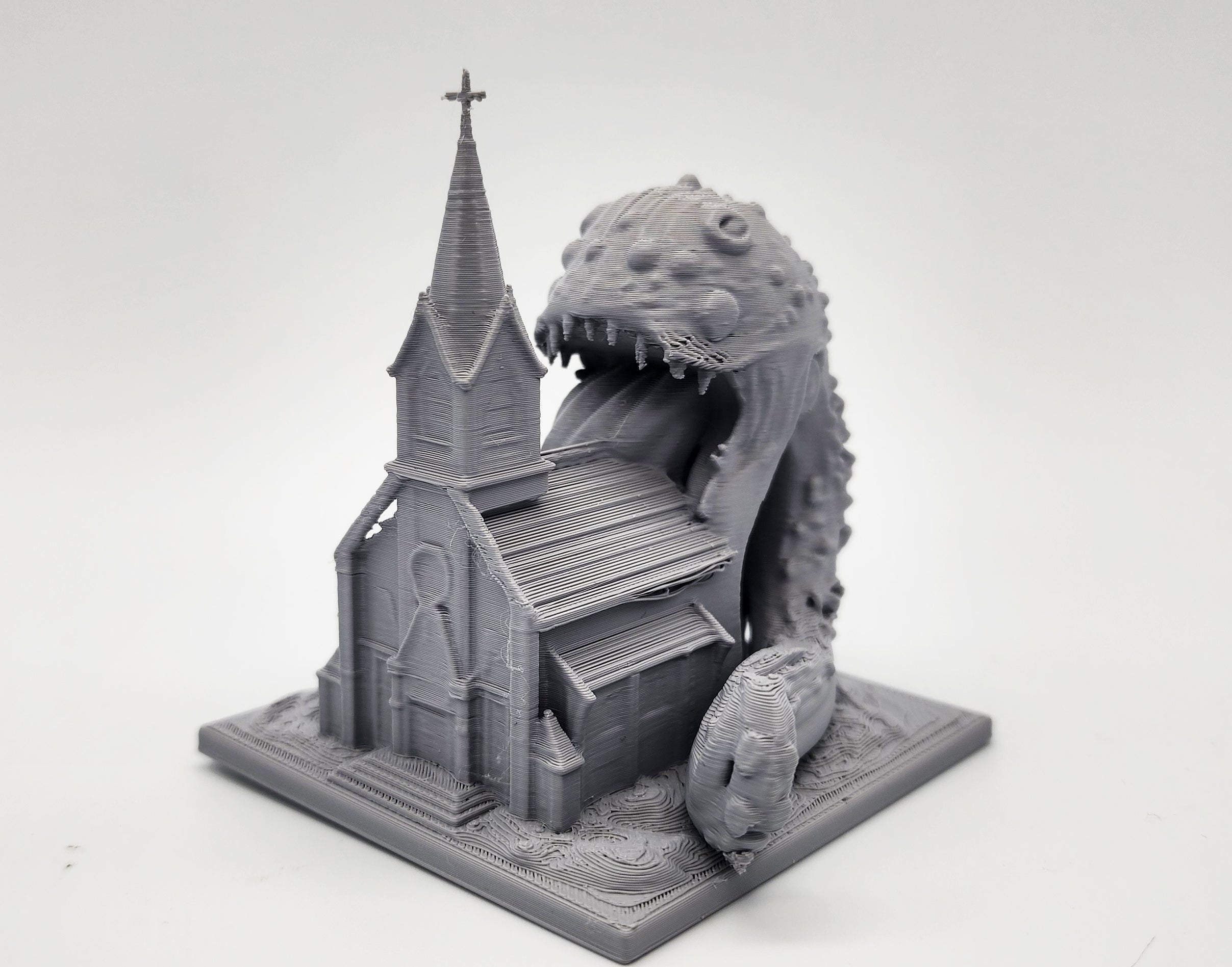 Cosmic Horror eating a Church Miniature