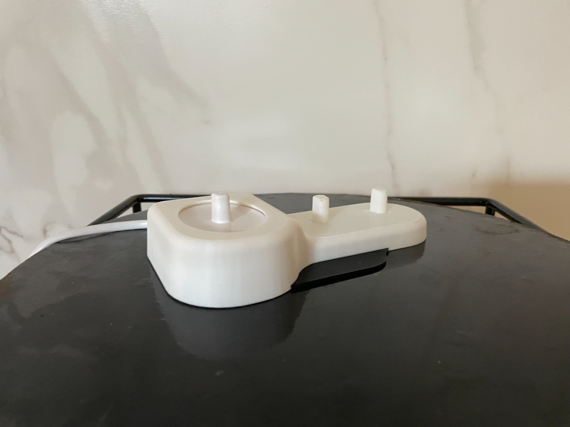 Toothbrush charger and stand