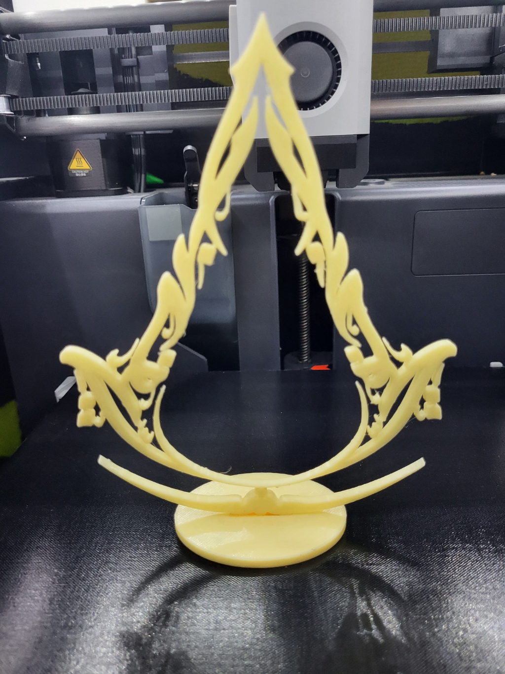 assassin's creed mirage logo and stand