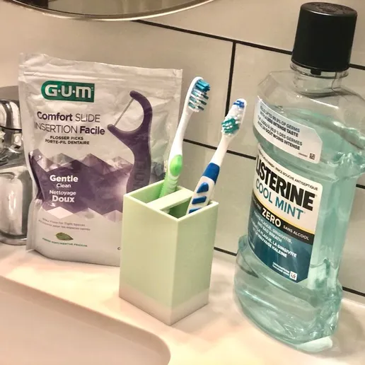 Toothbrush holder Two-part with removable bottom