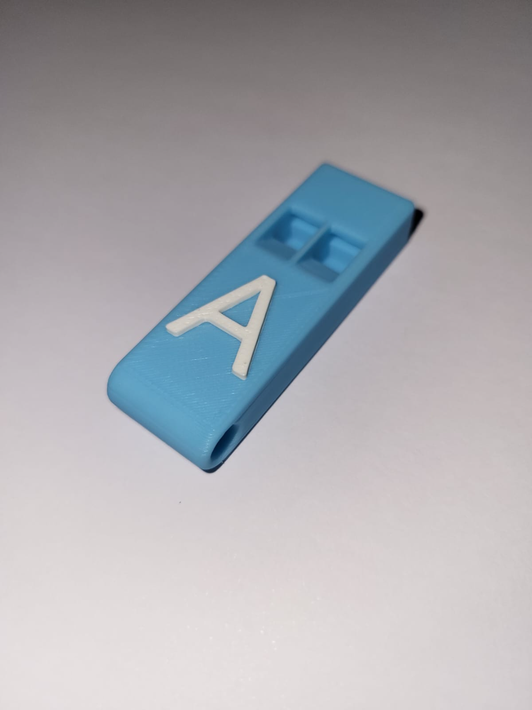 Whistle with letter A