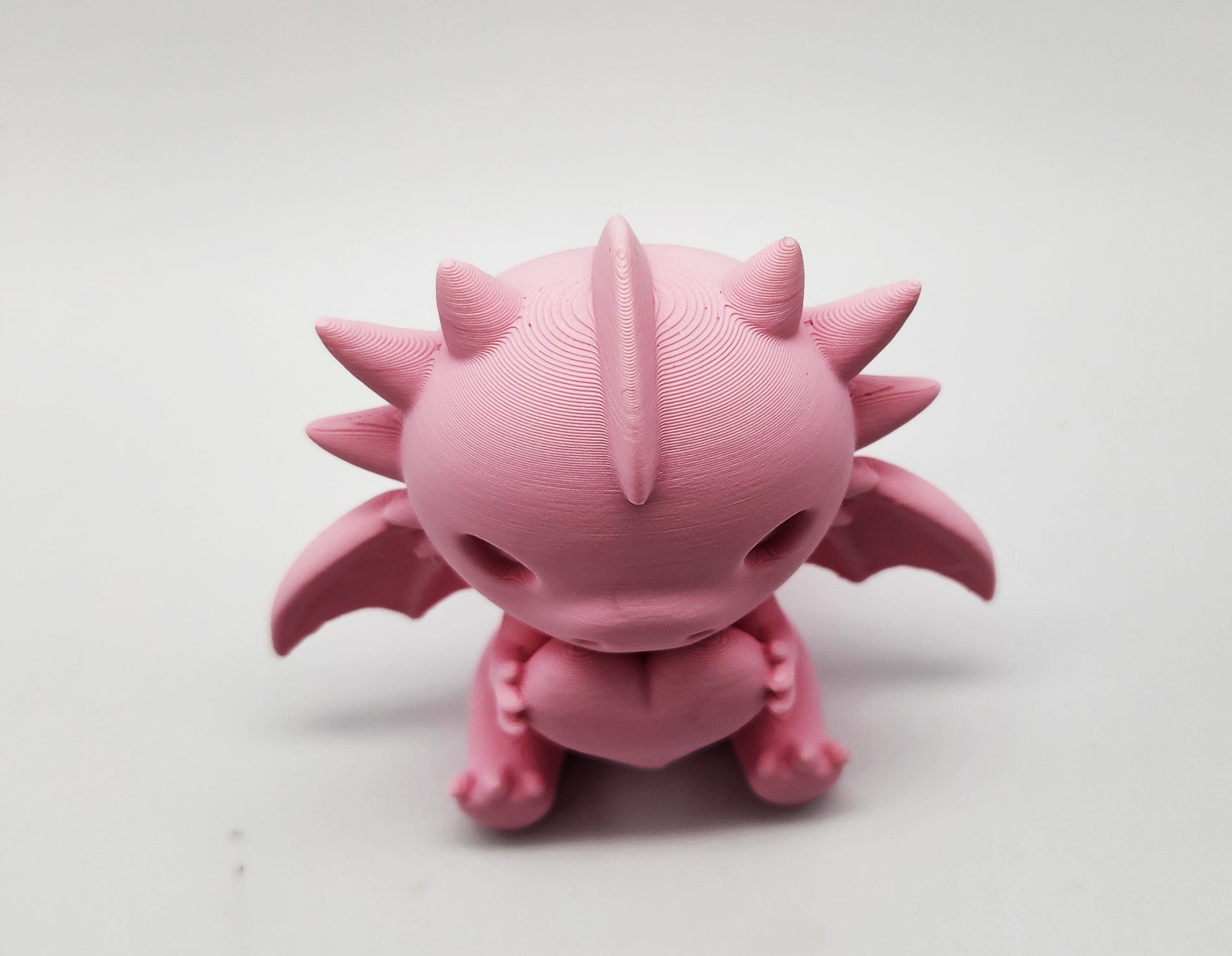 Cute Sitting Dragon with Heart Figure