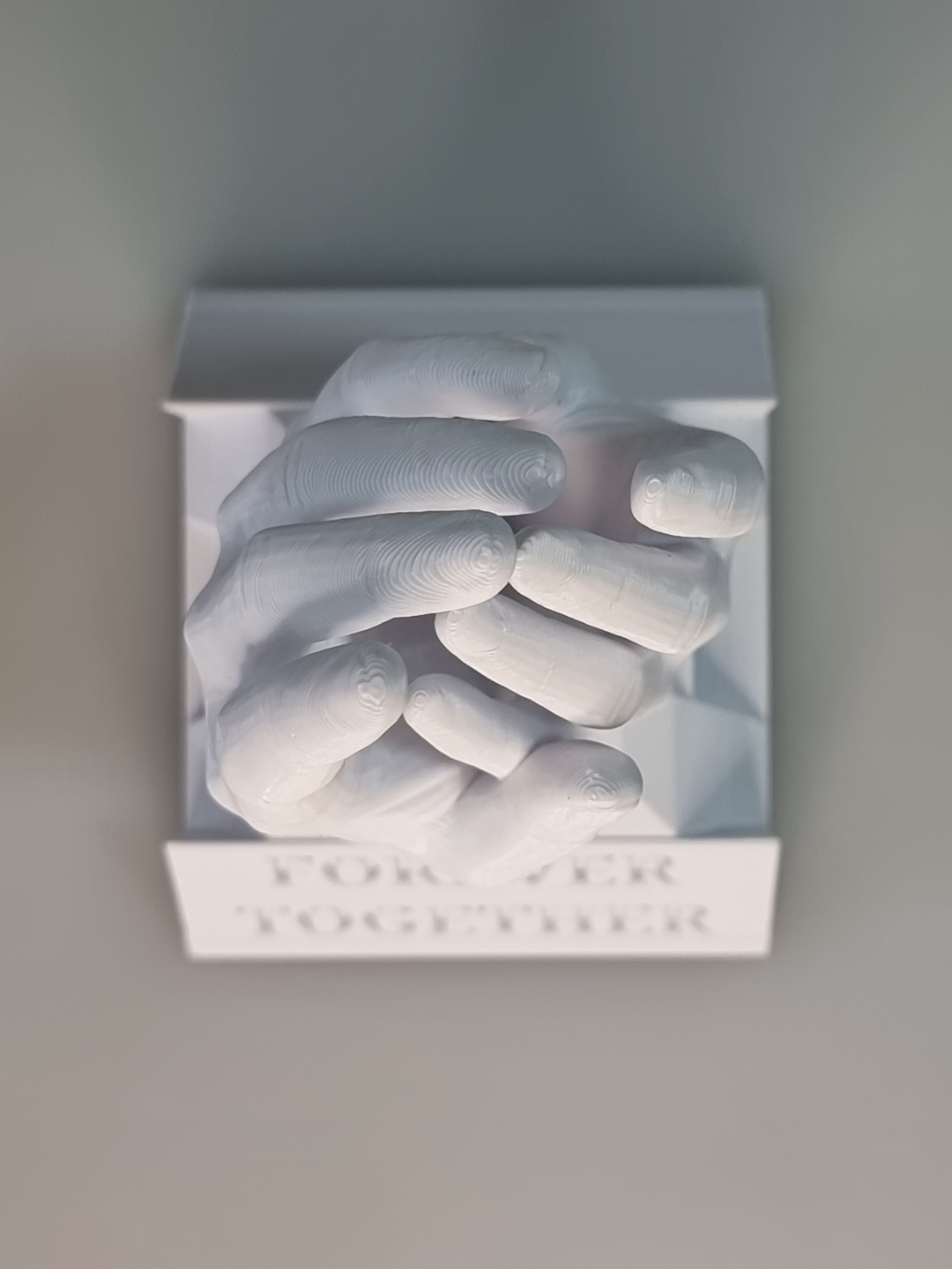 Holding hands with message
