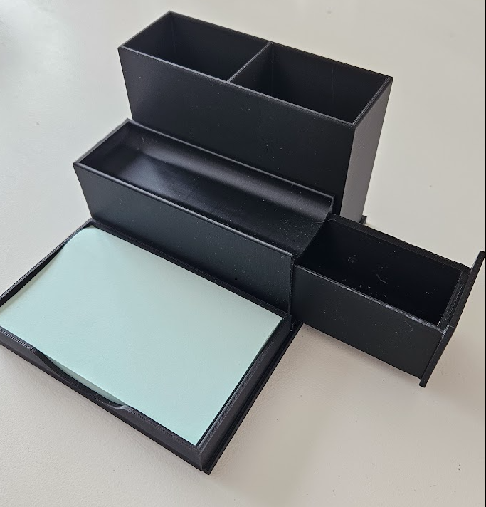 Desk organizer with a "hidden" drawer