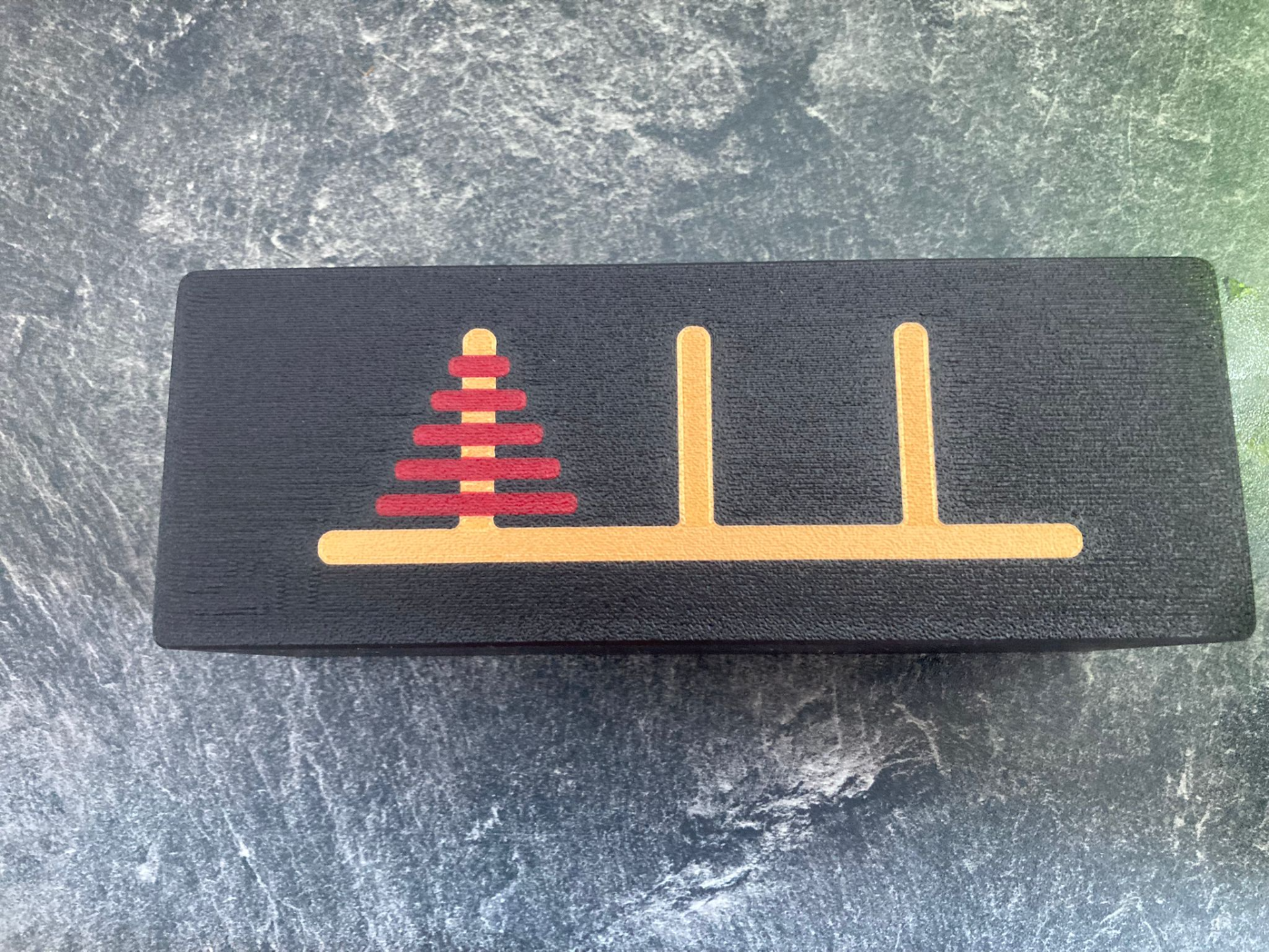 Tower of Hanoi with storage box