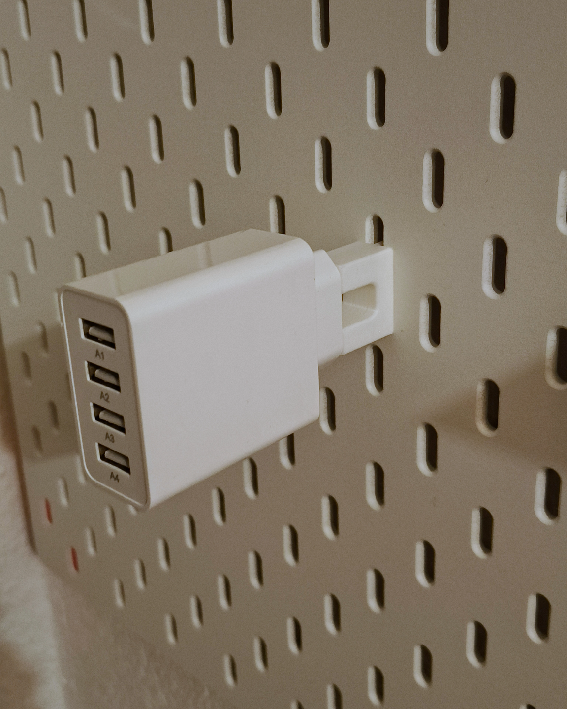 IKEA Skadis pegboard: EU phone charger holders