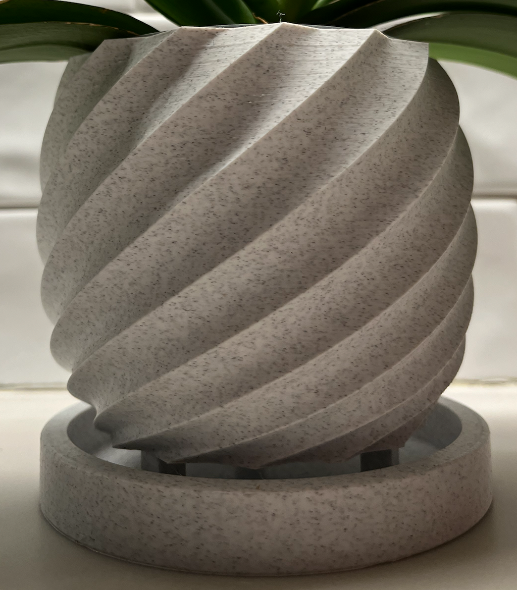 Flower pot with spiral design