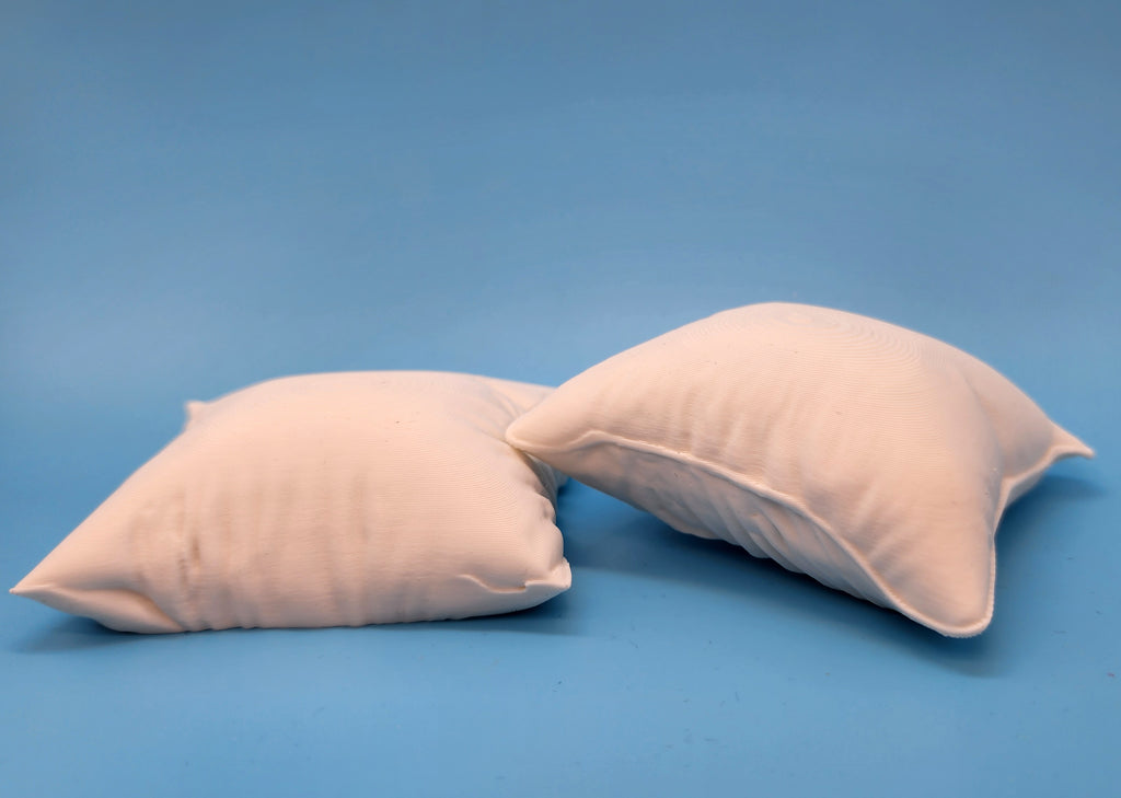 2 Fluffy Square Pillows