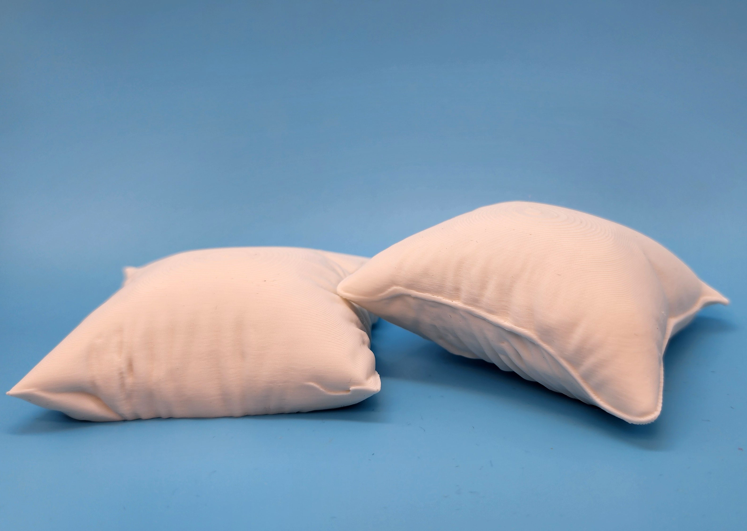 2 Fluffy Square Pillows