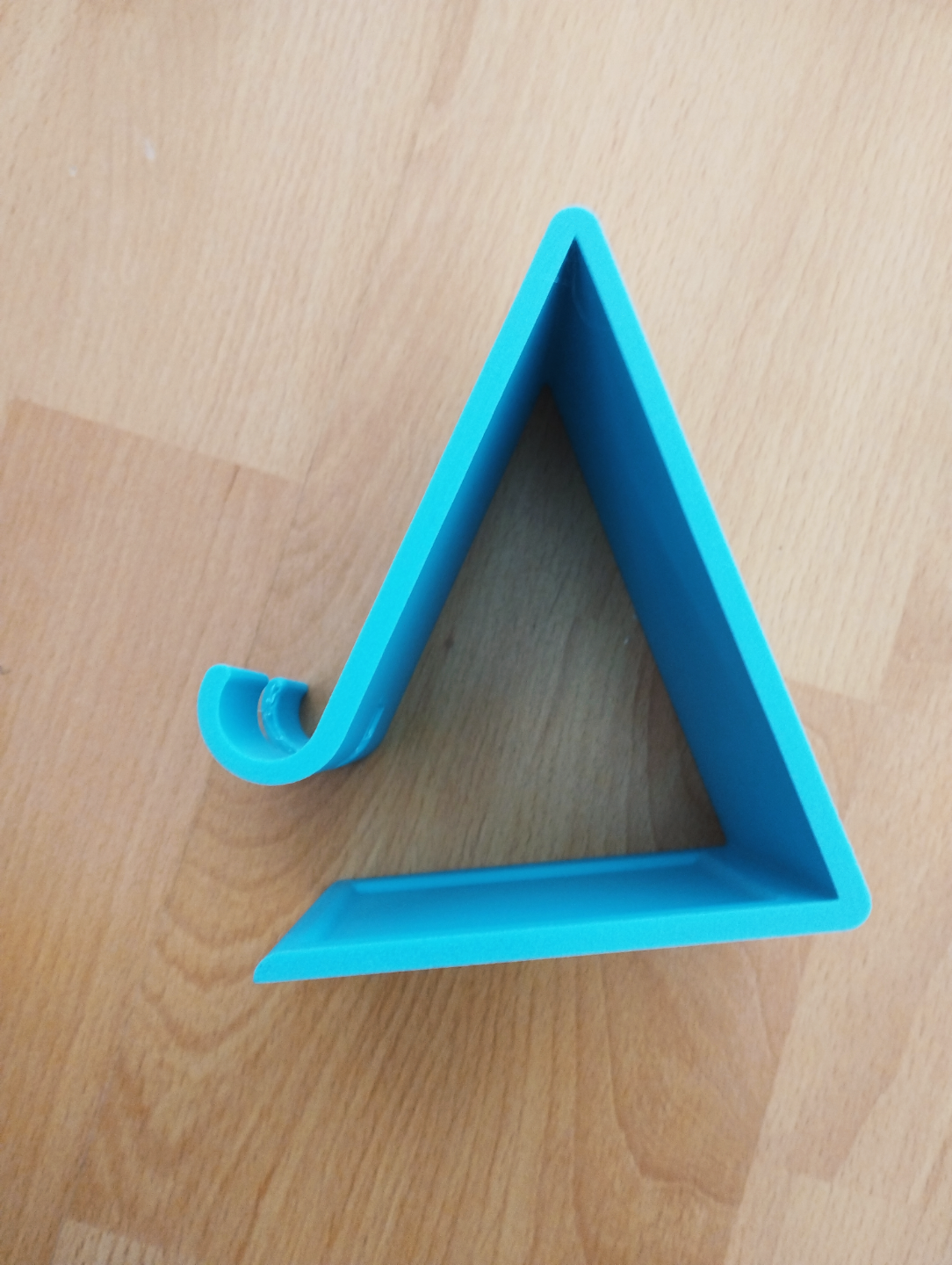 phone holder with charging cable hole