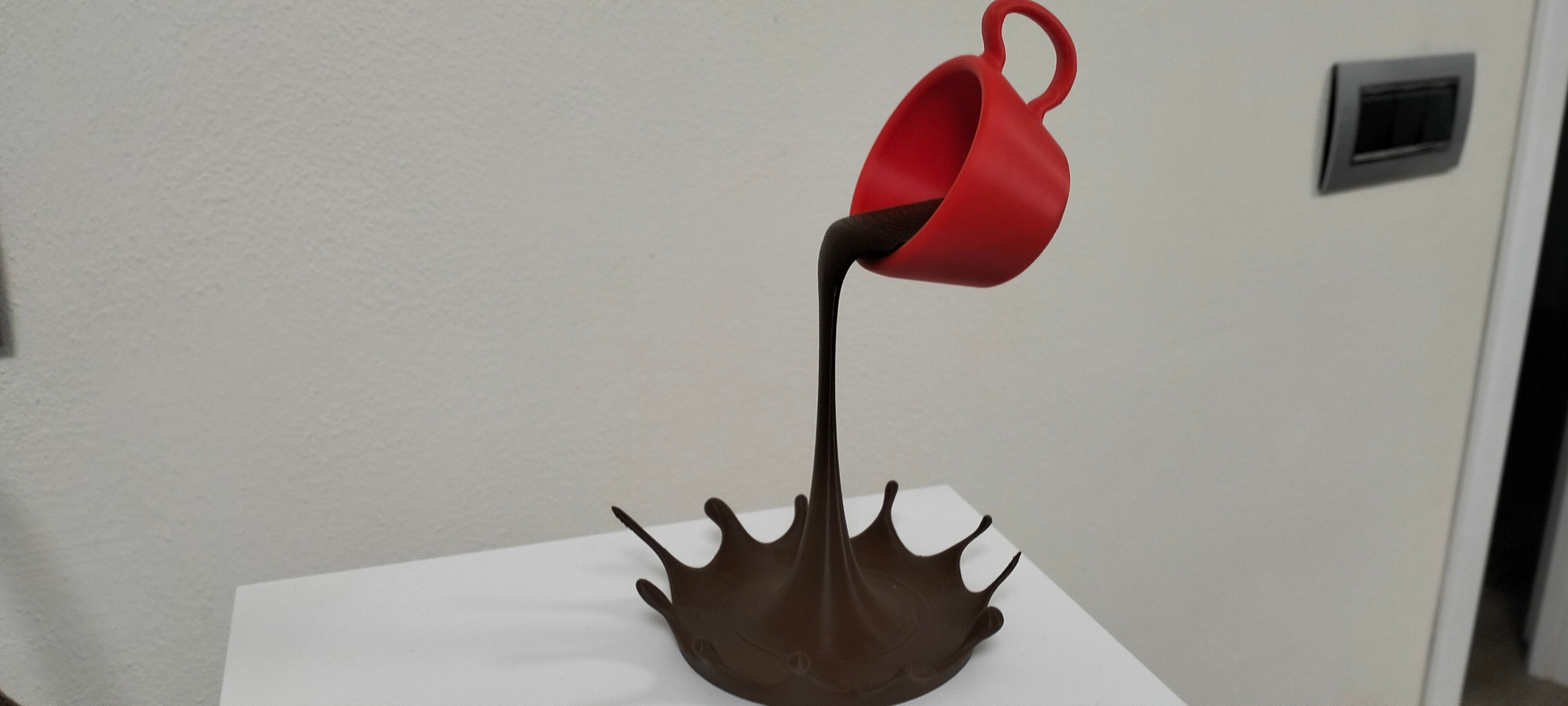 Floating coffee cup