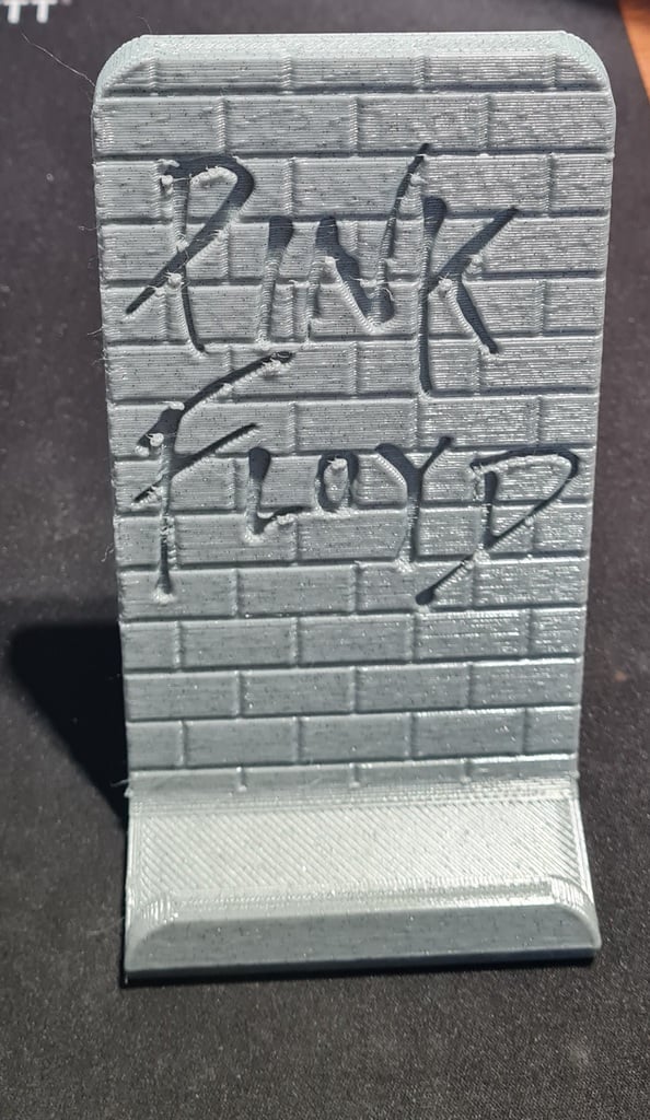 Phone stand Pink Floyd The Wall. Free to sell.