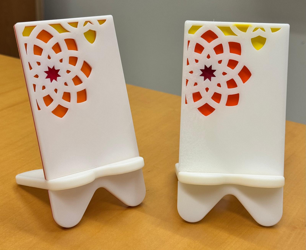 Elegant phone stand with engraved design pattern