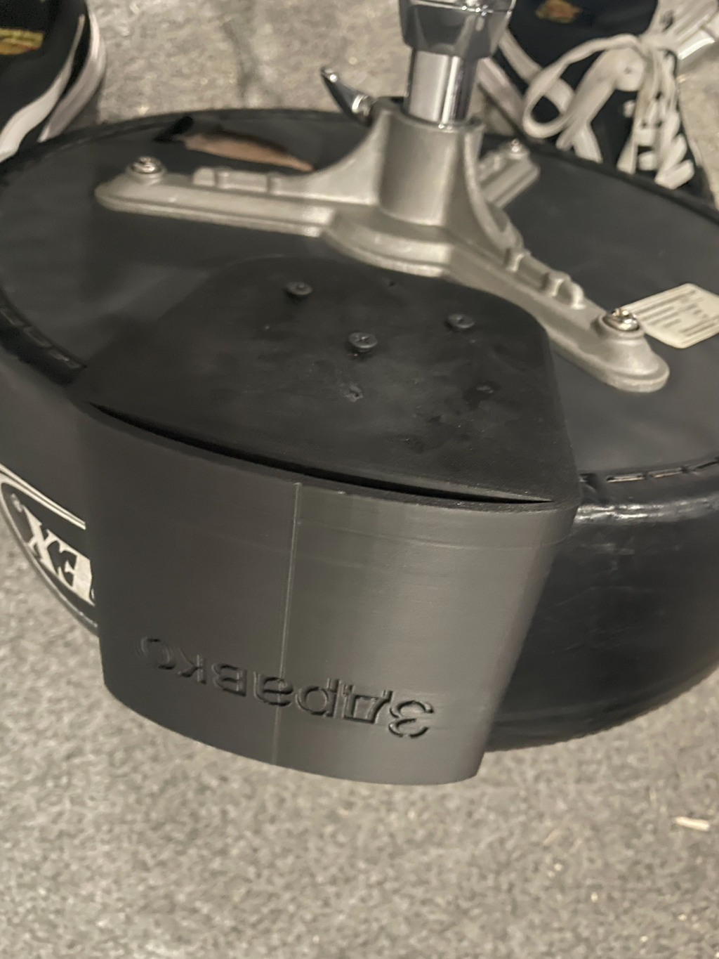 In ear holder for drum throne