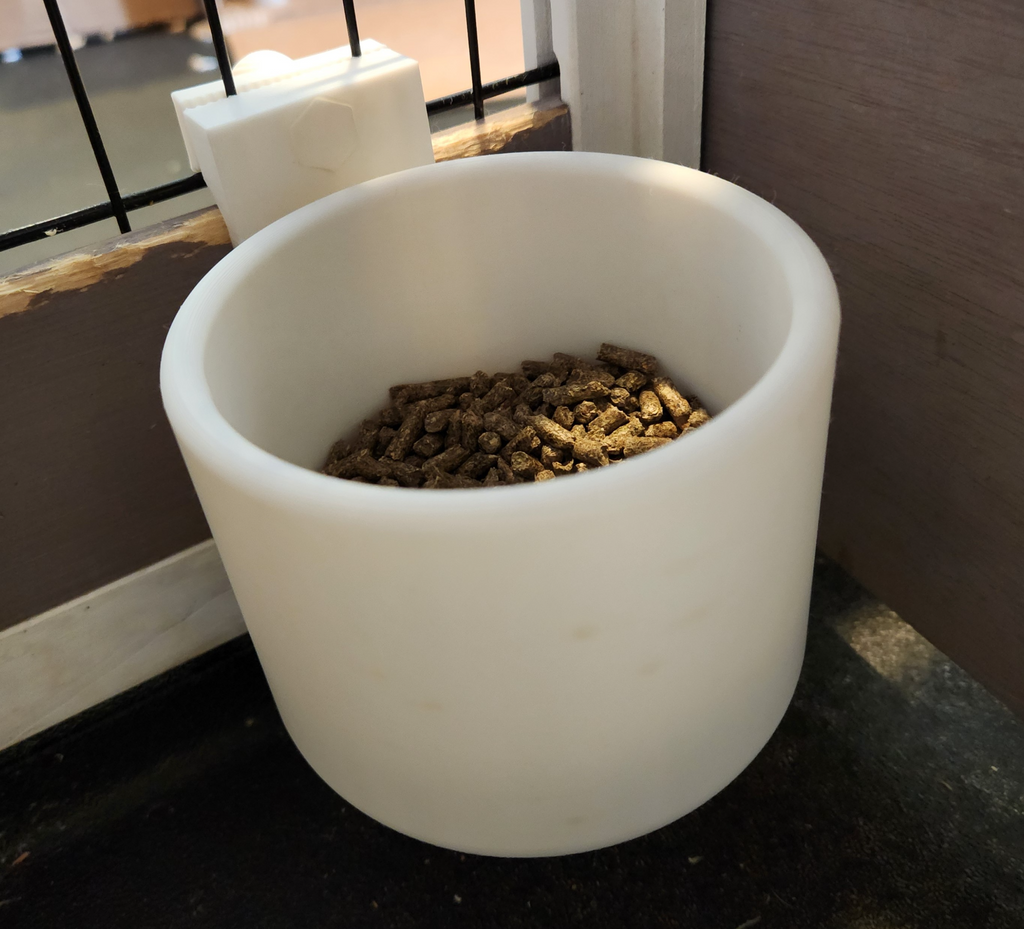 Pet cage feeder