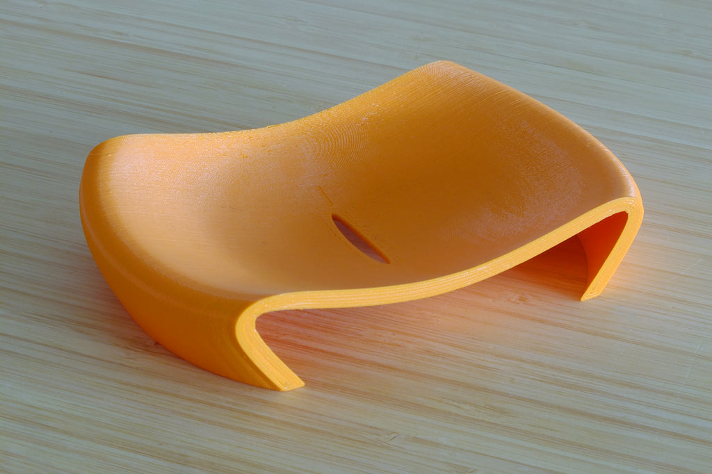 Curved soap holder