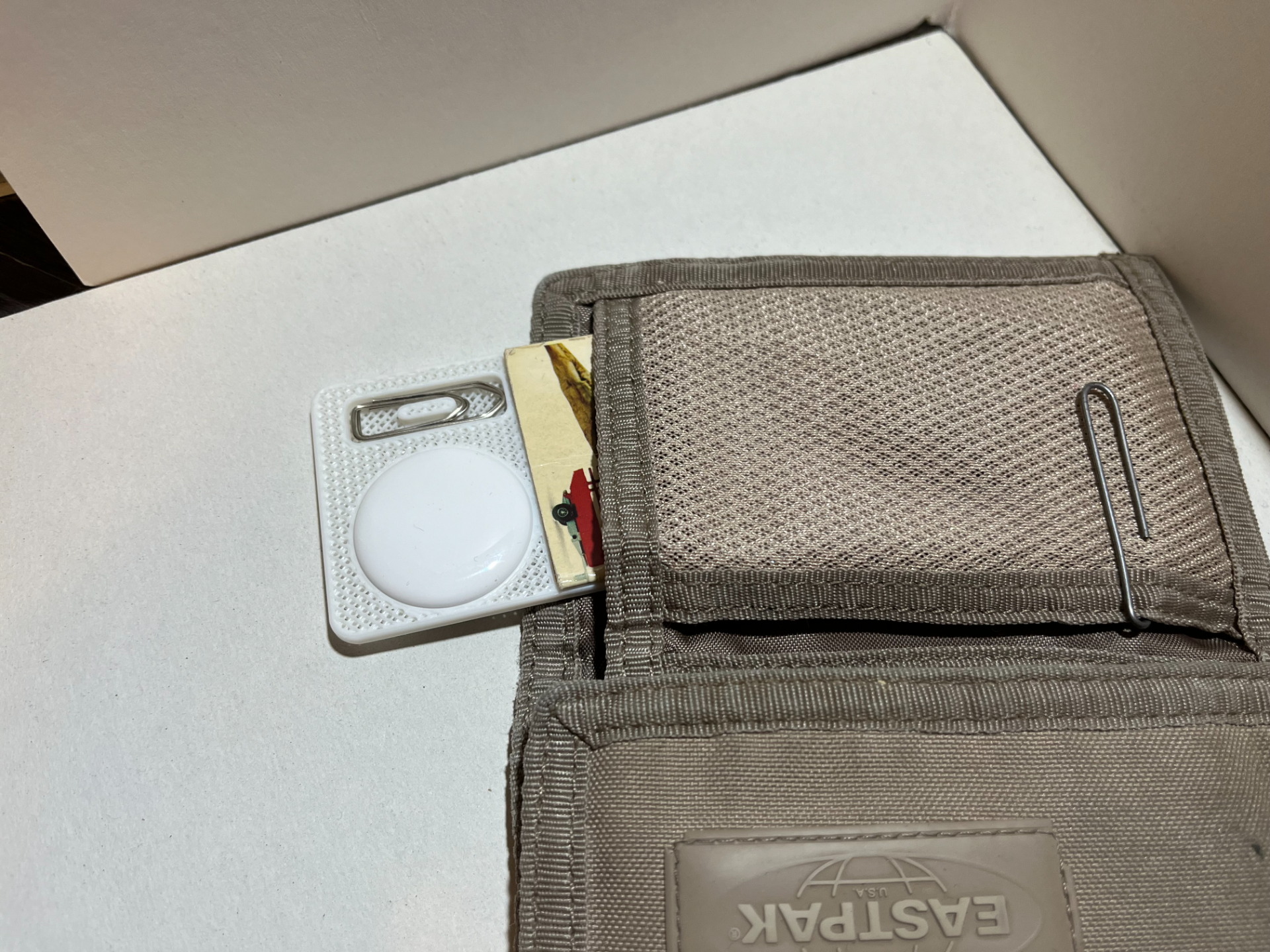 Wallet card for AirTag