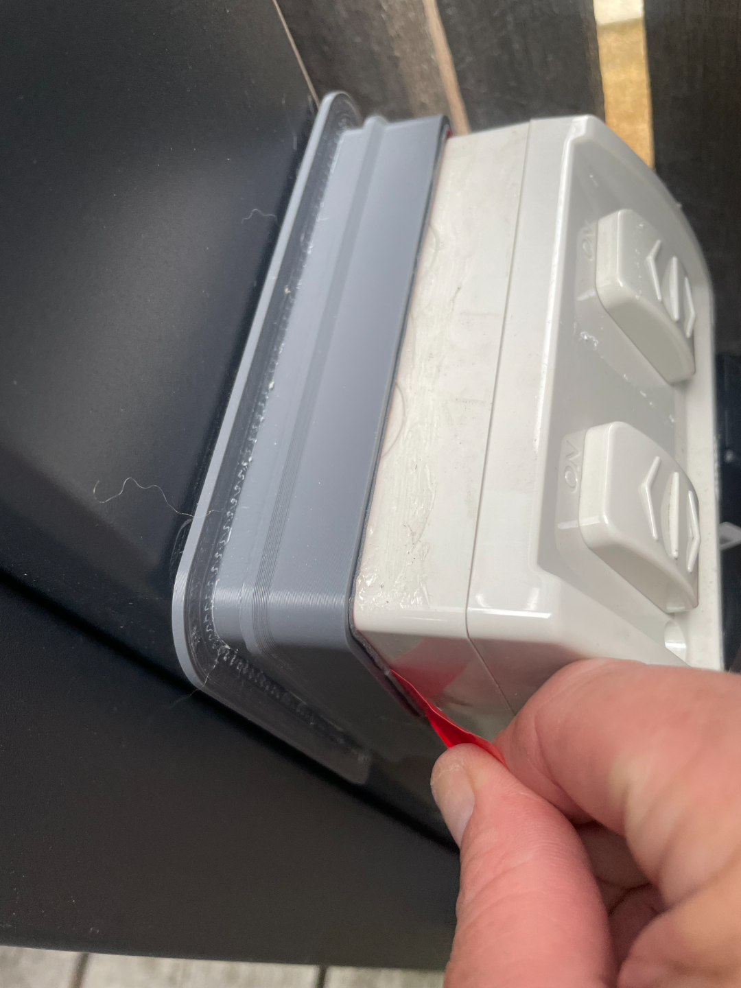 Weather shield for outside power outlet