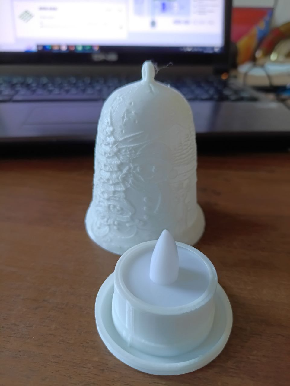 The basis of a New Year's bell for a tea candle
