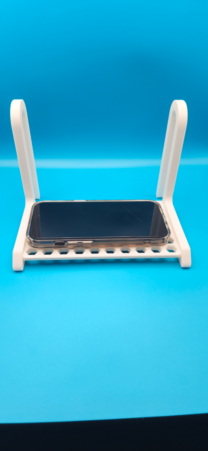 Handy/Cell phone bed holder