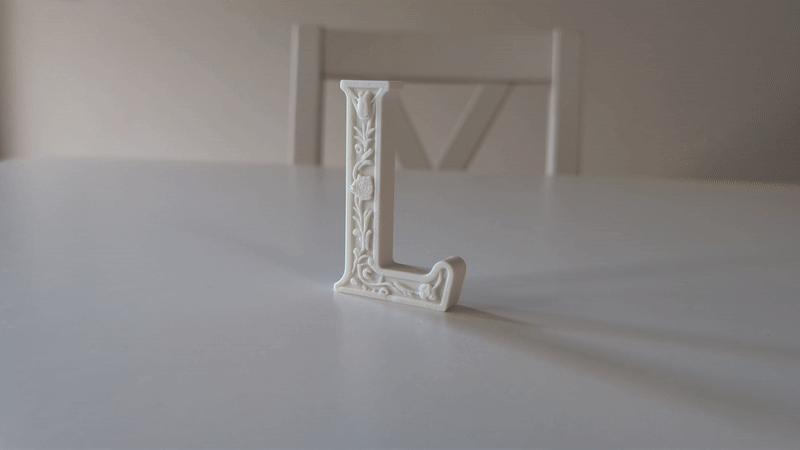 Standing Letter L in a Gypsum Floral Style