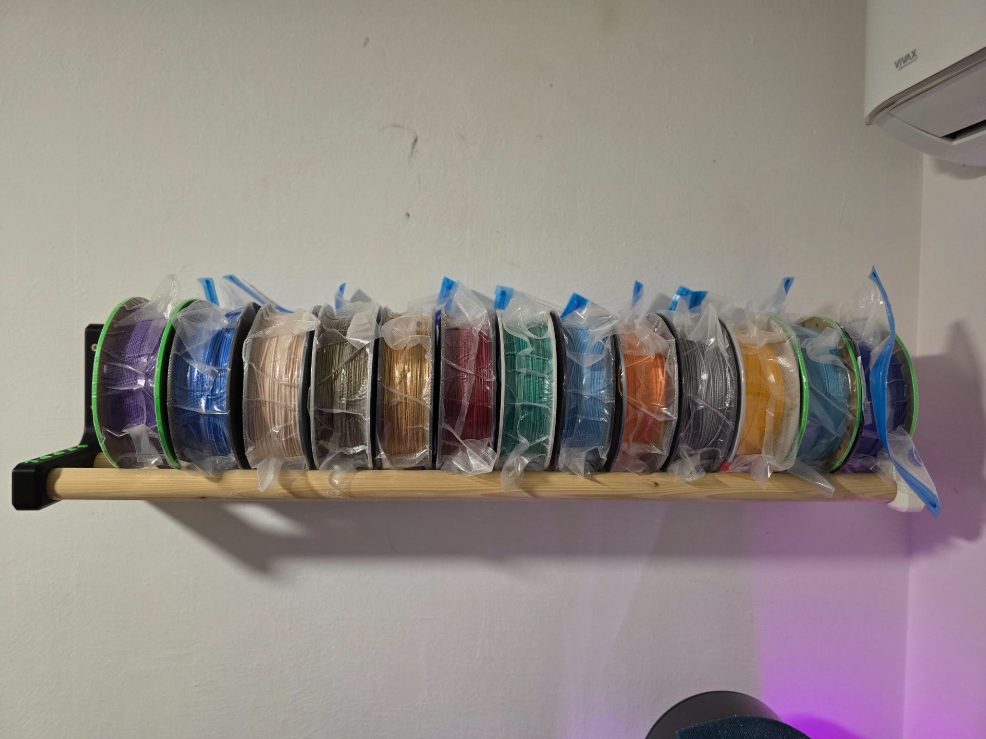 SPOOL WALL HOLDER