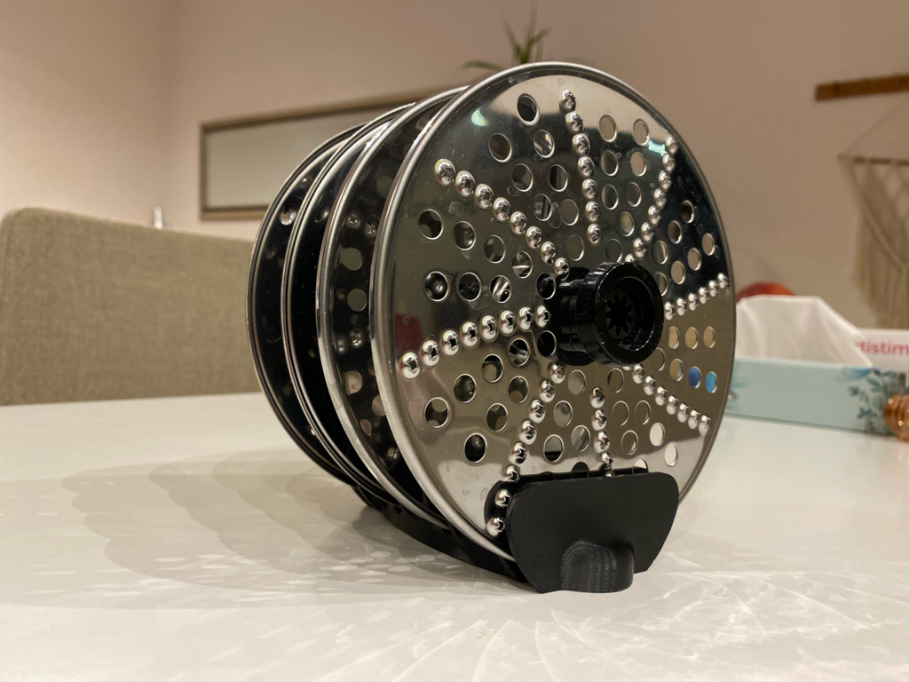 Attachment holder for a kitchen food processor