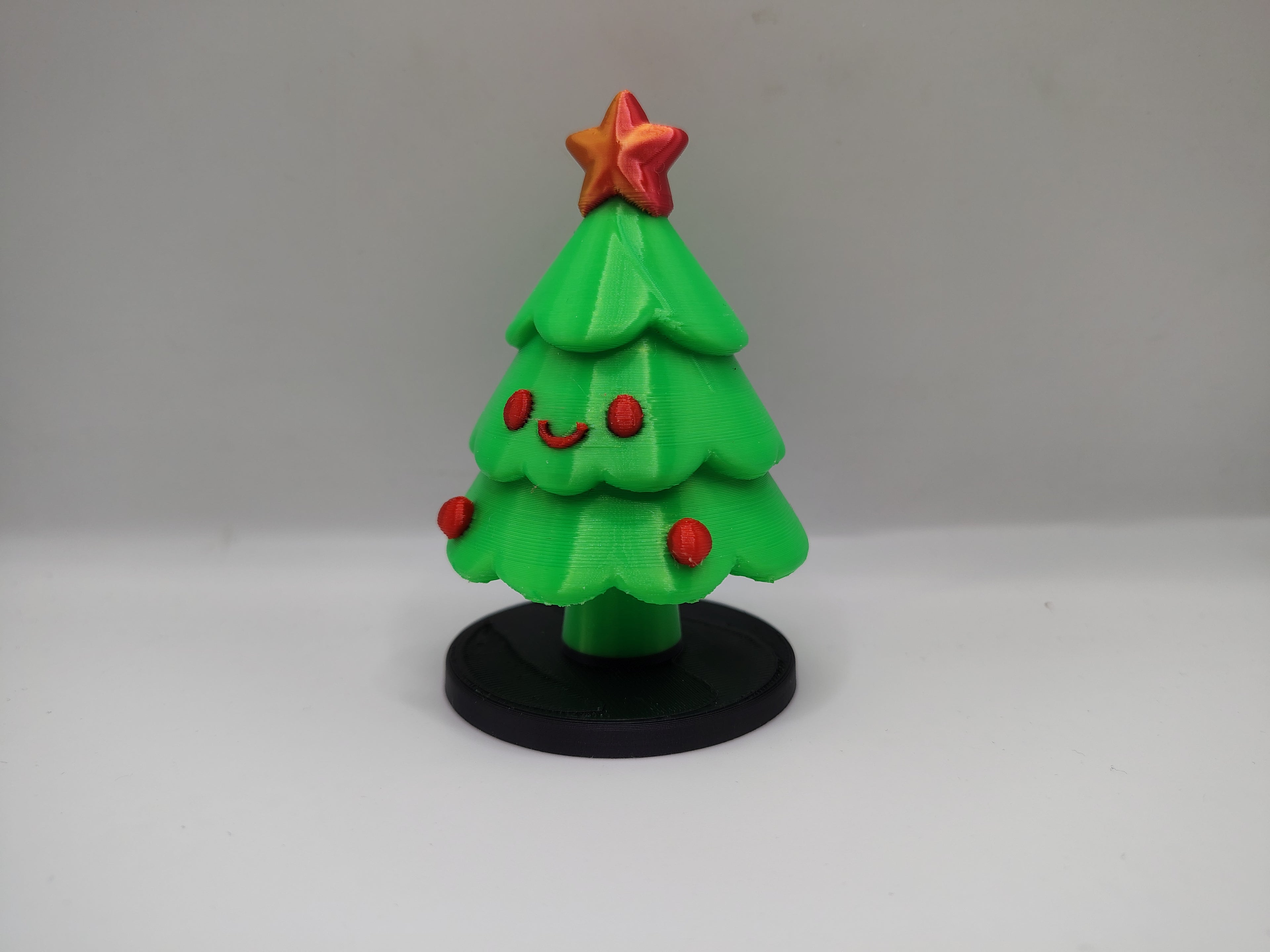 Smiling Christmas Tree with Star Topper