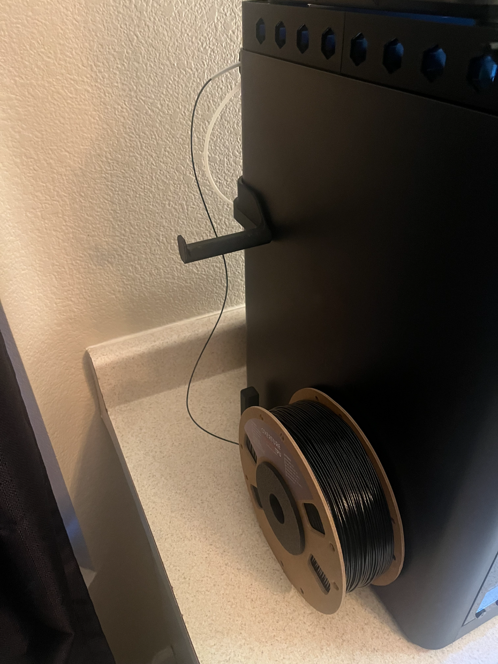 Overture spool adaptor for side spool mount