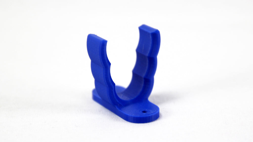 Universal hook for brooms and vacuum cleaners