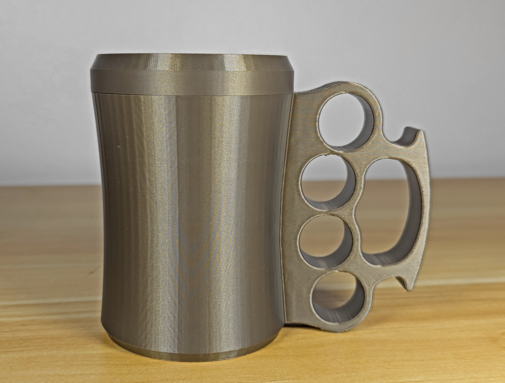 Brass Knuckle 12oz Can Koozie