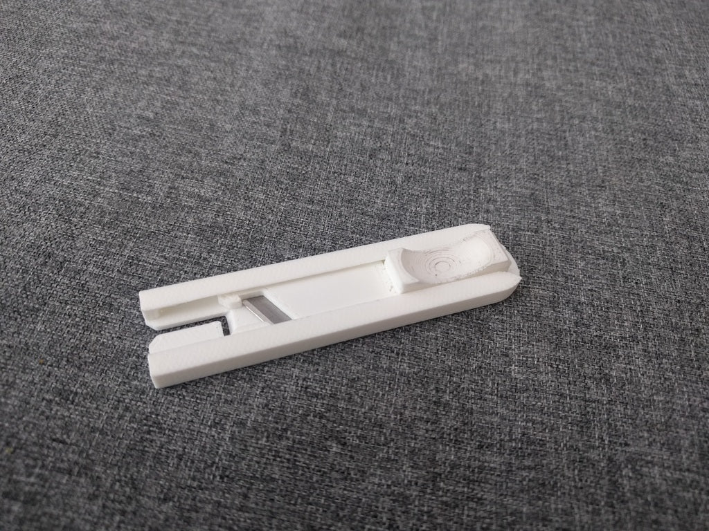 Filament cutter (only 18mm snap off blade needed)