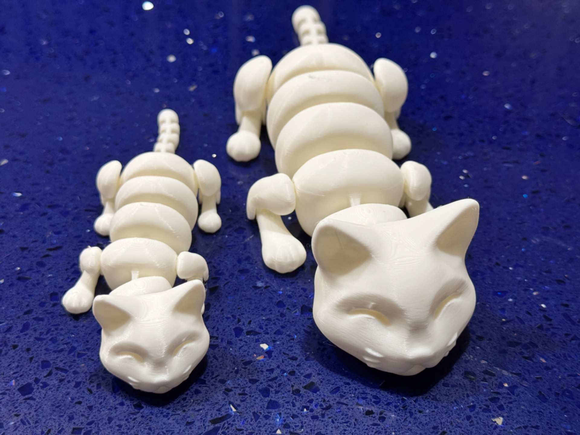 Sleepy cat and sleepy kitten: articulated cats