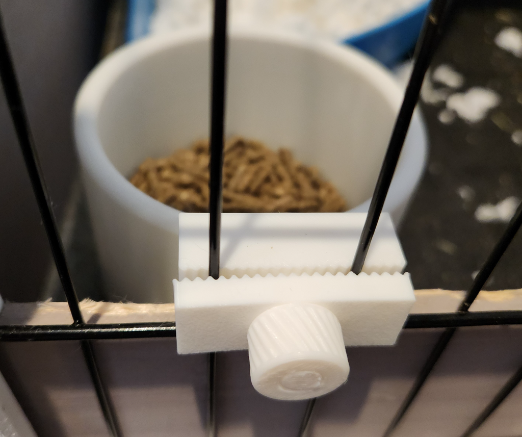 Pet cage feeder