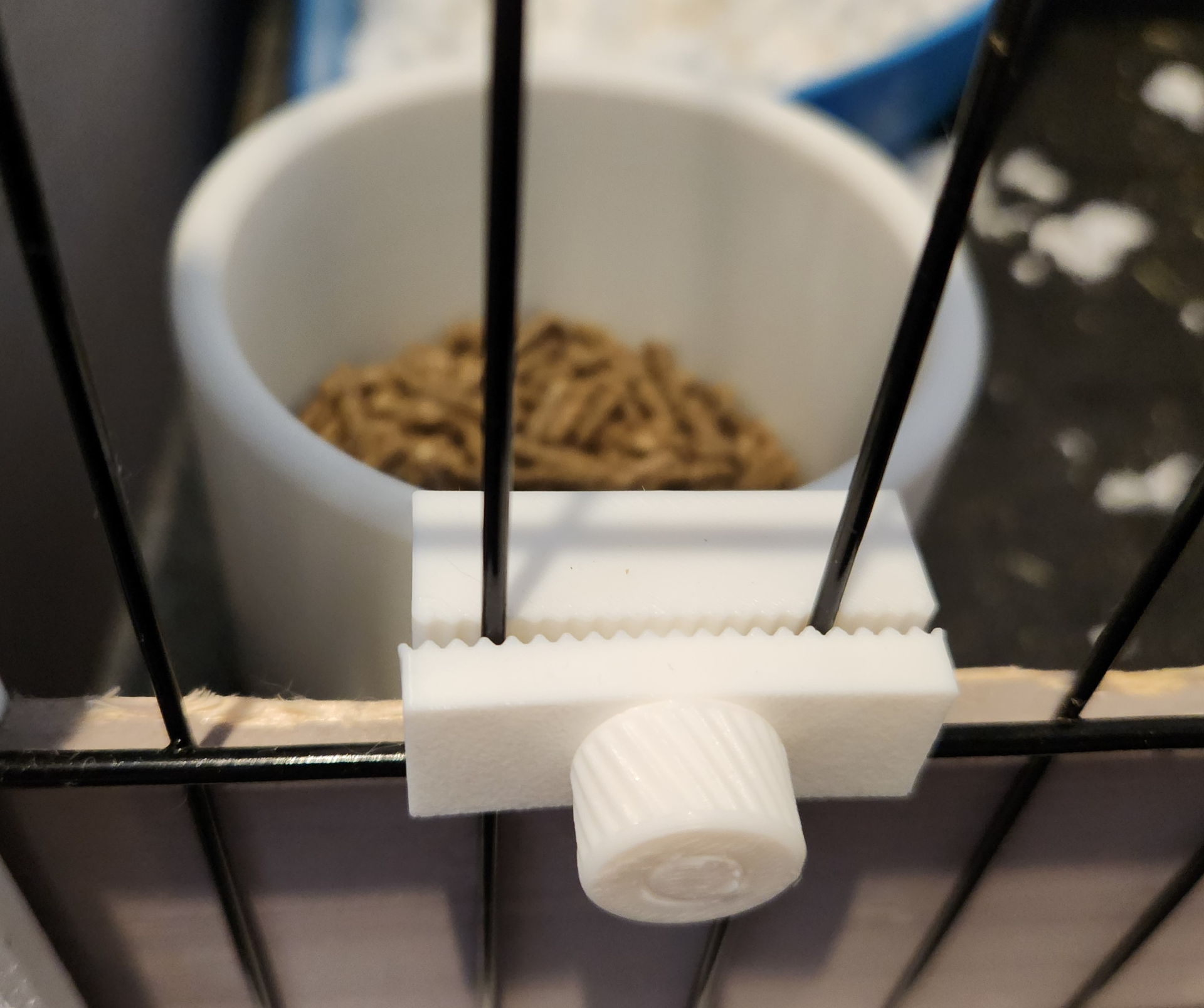 Pet cage feeder