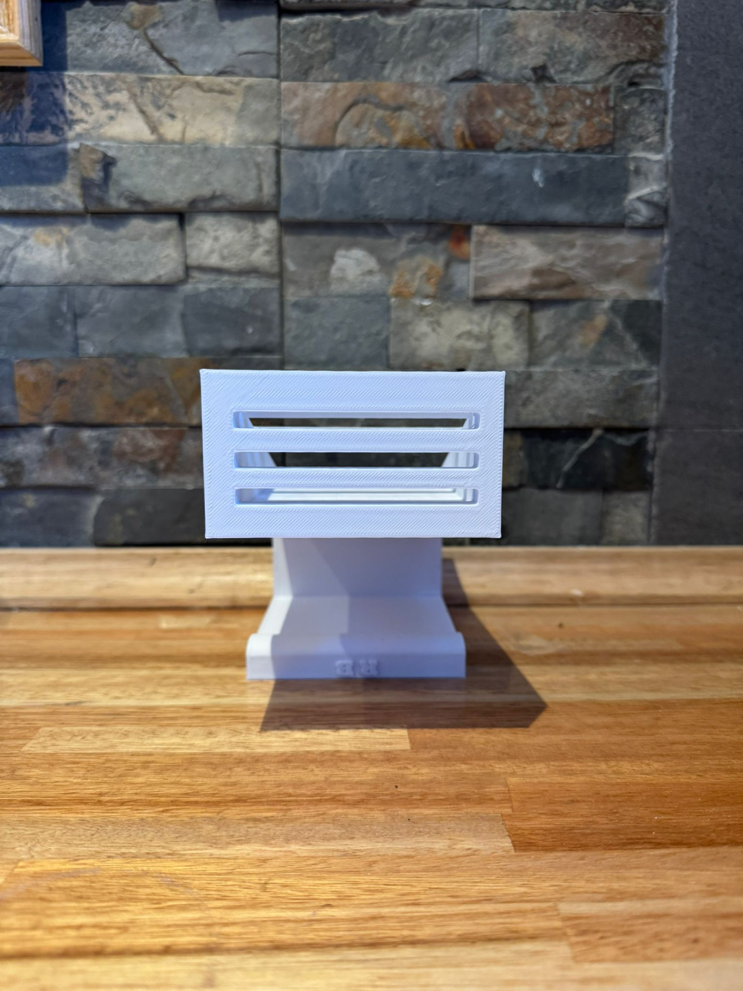 Soporte de celular para mampara de ducha