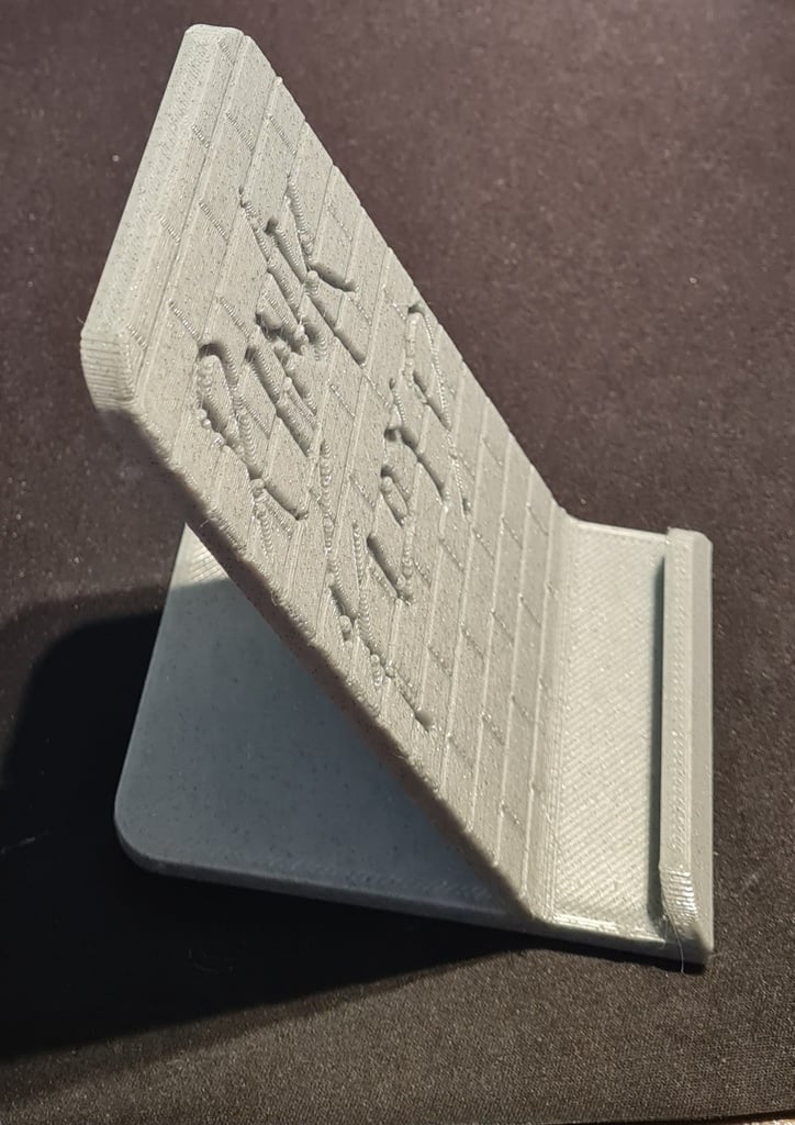 Phone stand Pink Floyd The Wall. Free to sell.