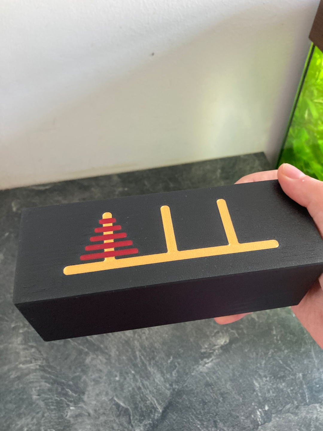 Tower of Hanoi with storage box