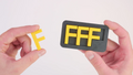 F Puzzle with Lid