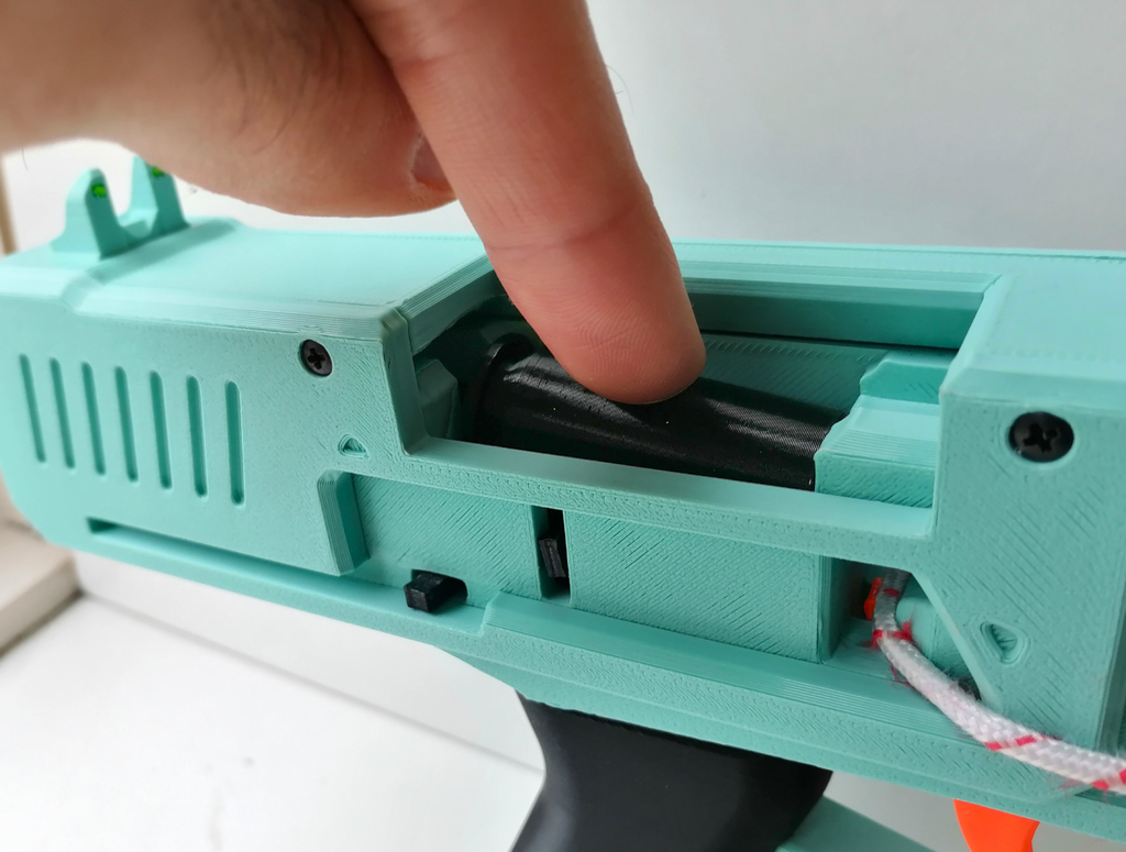 Shell ejecting Nerf string blaster