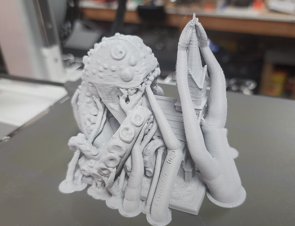 Cosmic Horror eating a Church Miniature