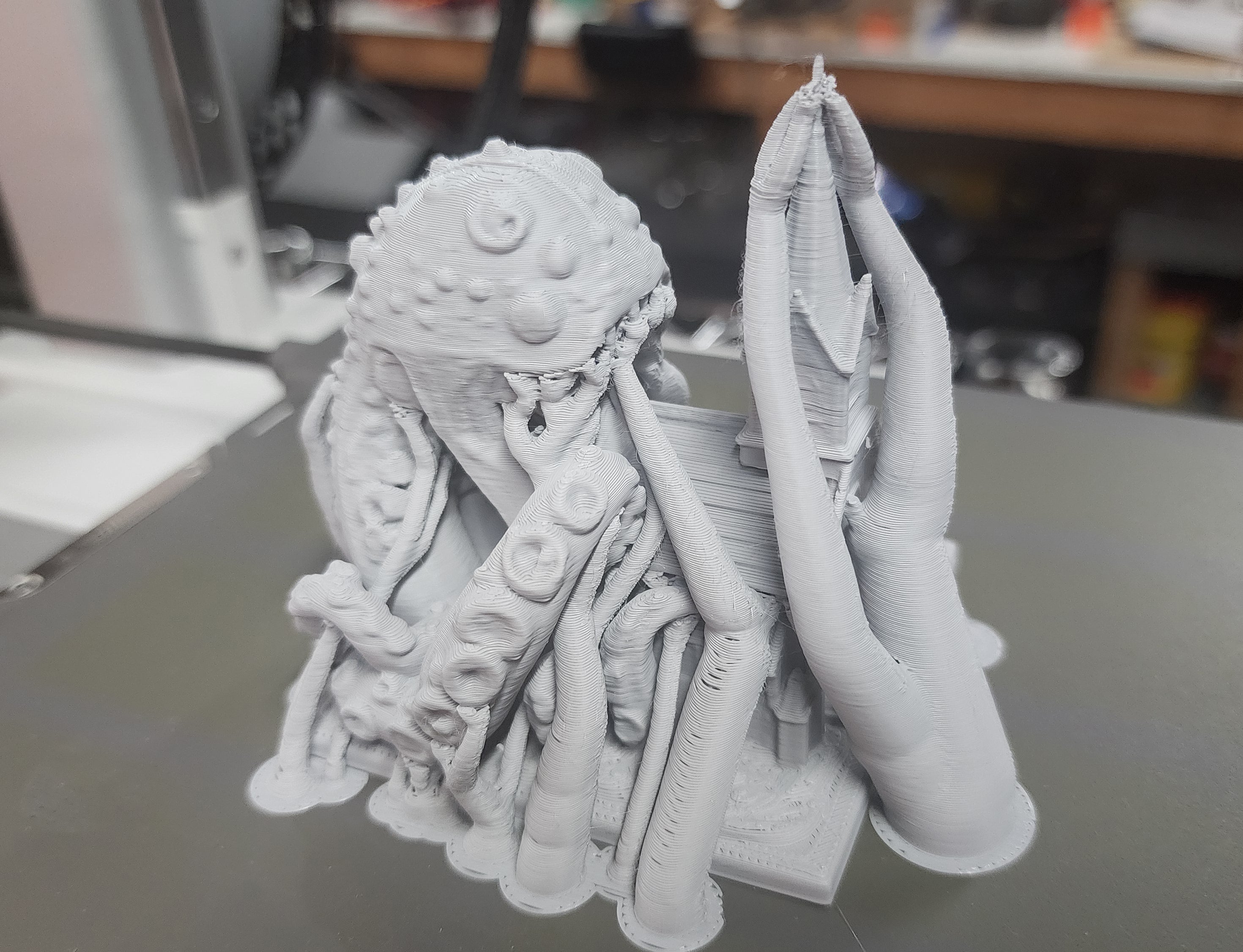 Cosmic Horror eating a Church Miniature
