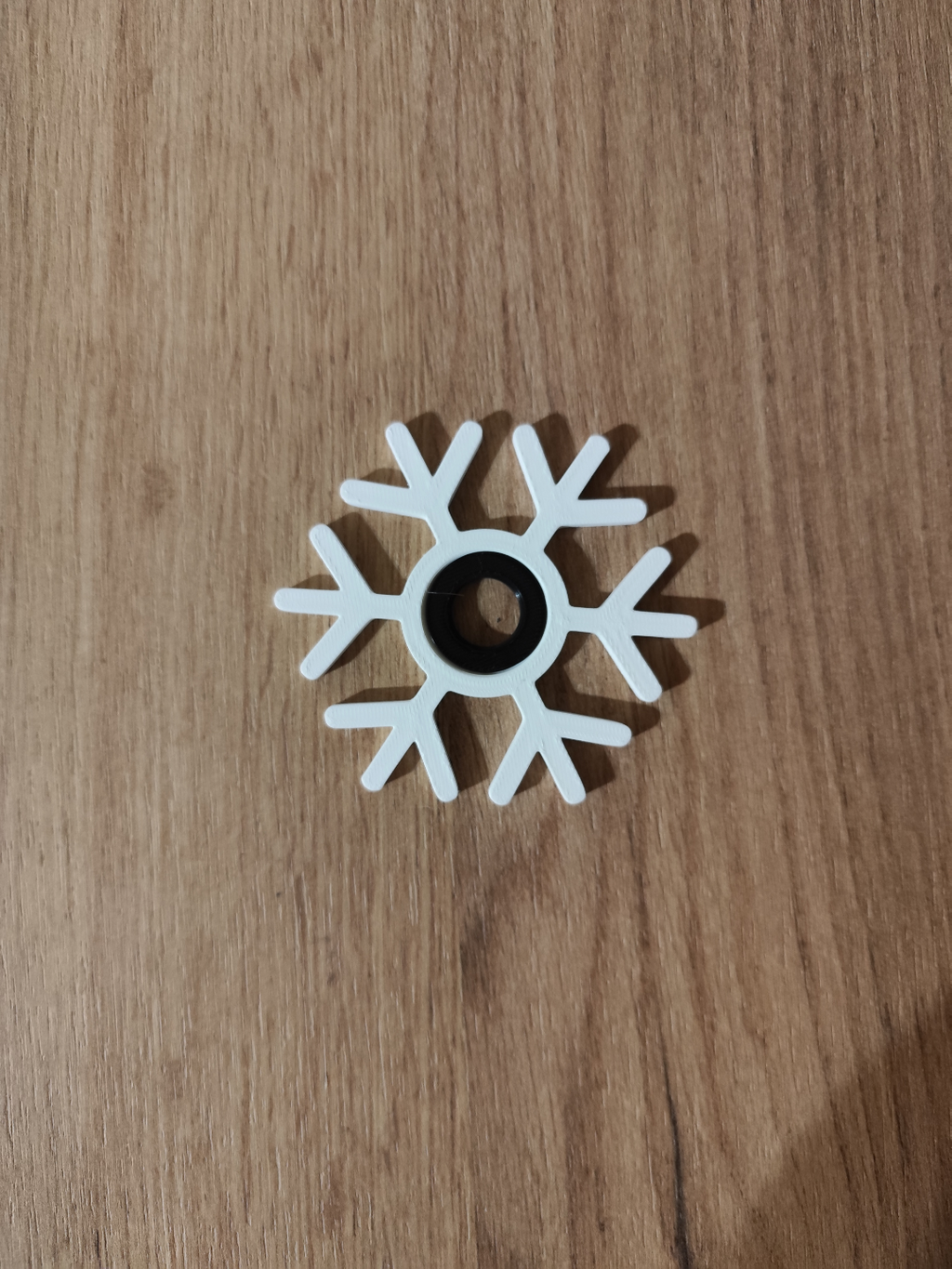Print in place snowflake spiners