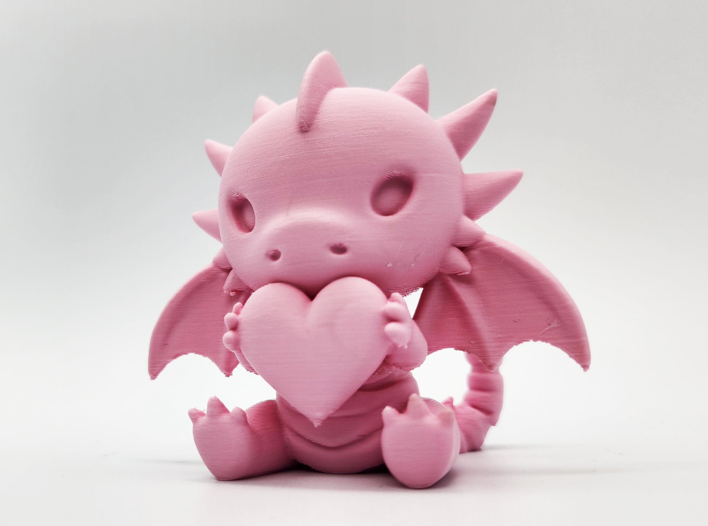 Cute Sitting Dragon with Heart Figure