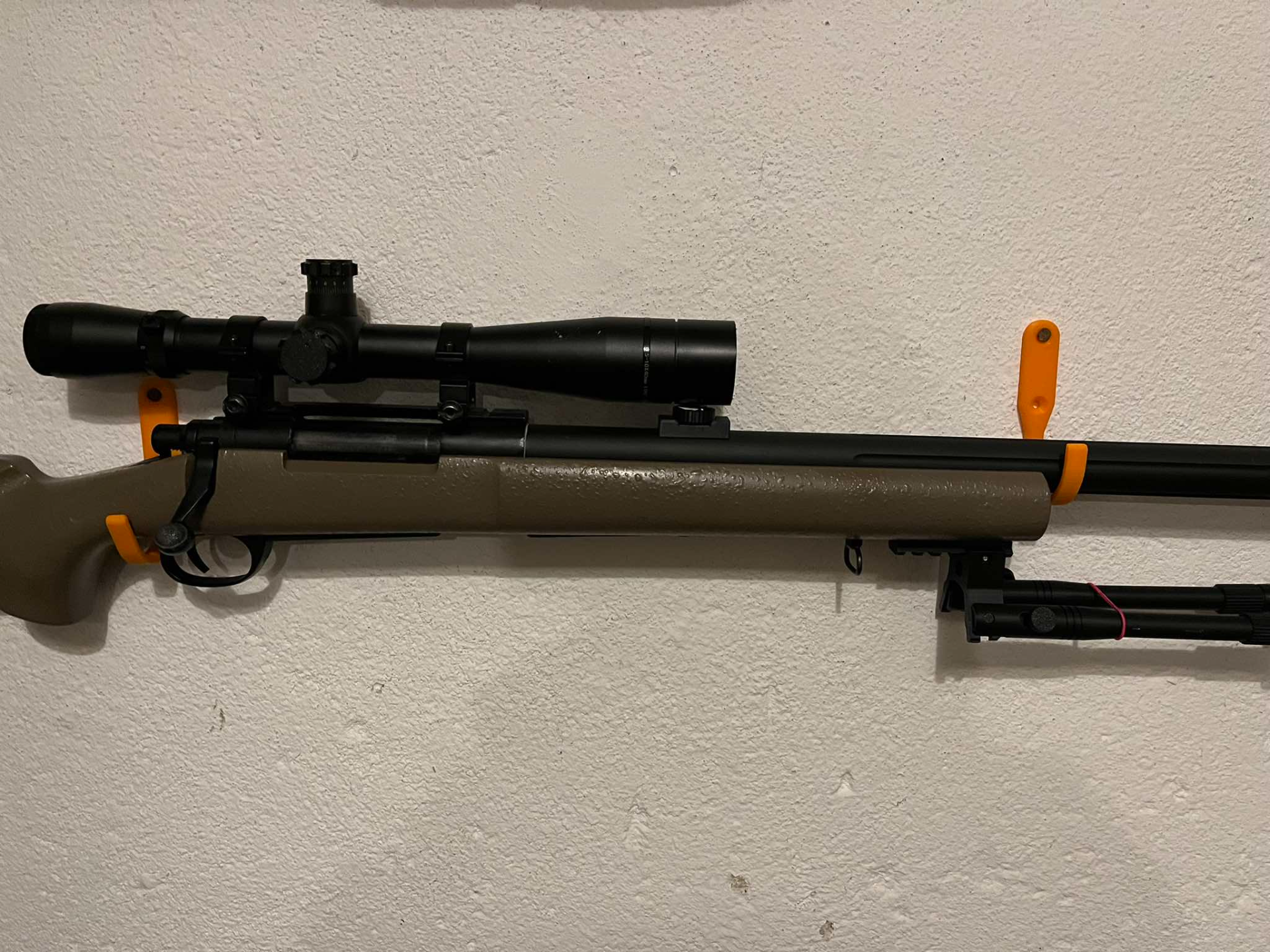 Airsoft gun mounts on the wall