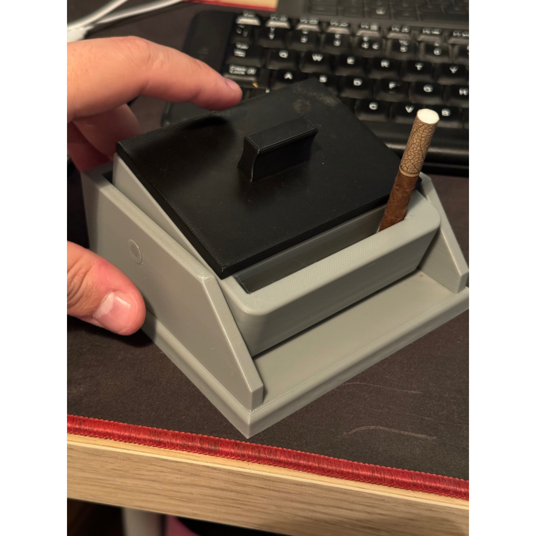 Cigarette box with lift feature