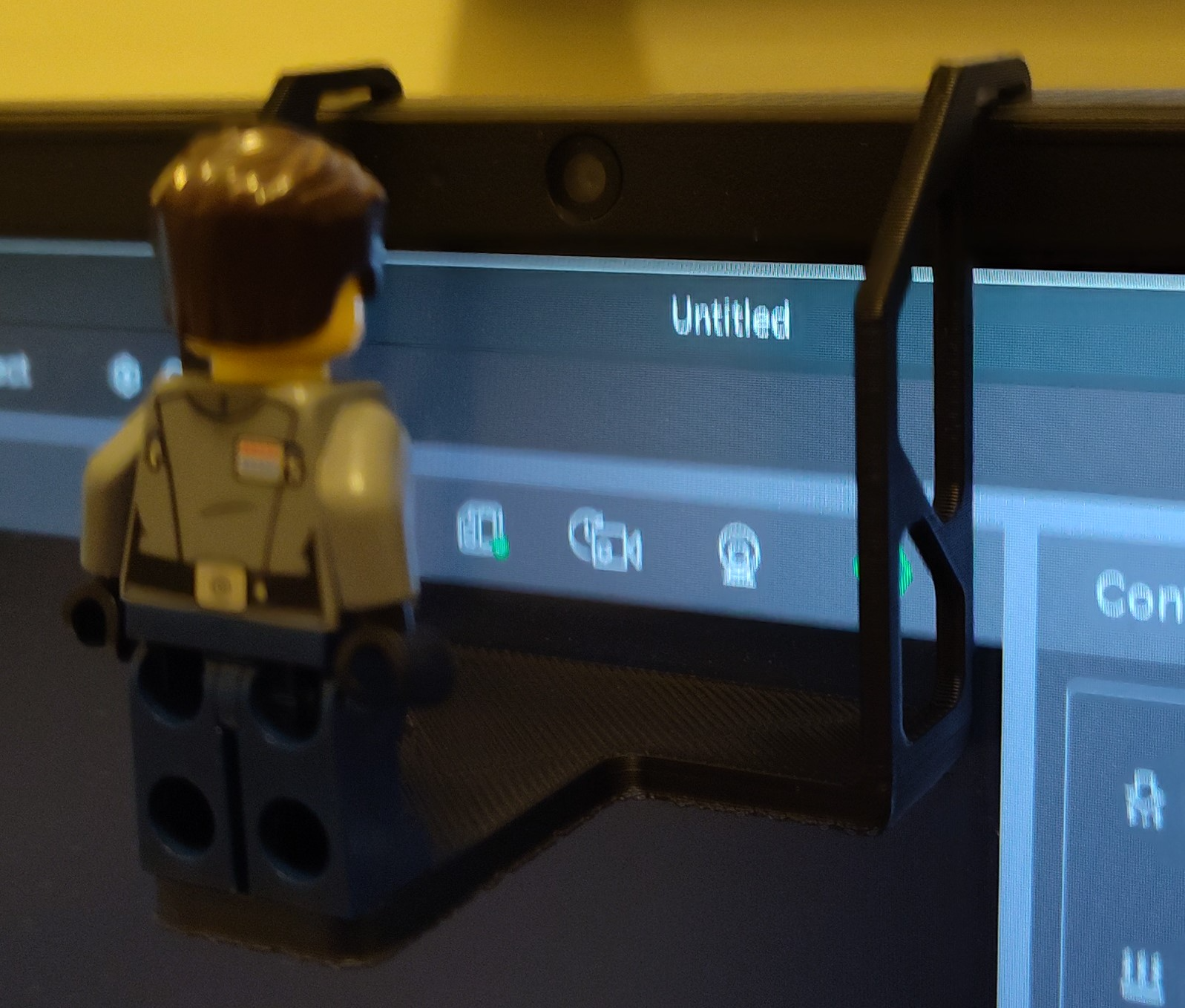 Brick person webcam hanger