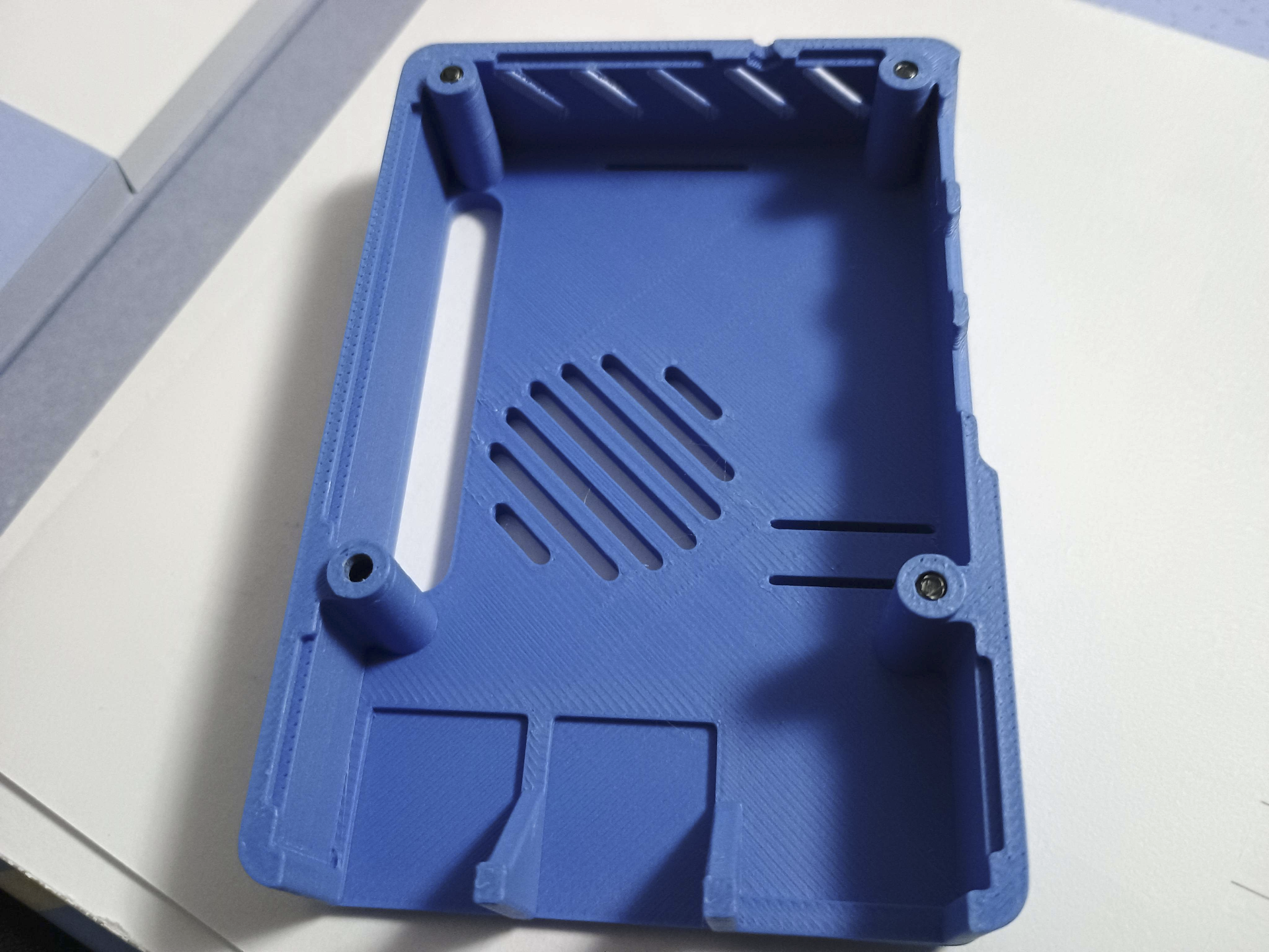 Raspberry Pi 5 case with screws and heat inserts