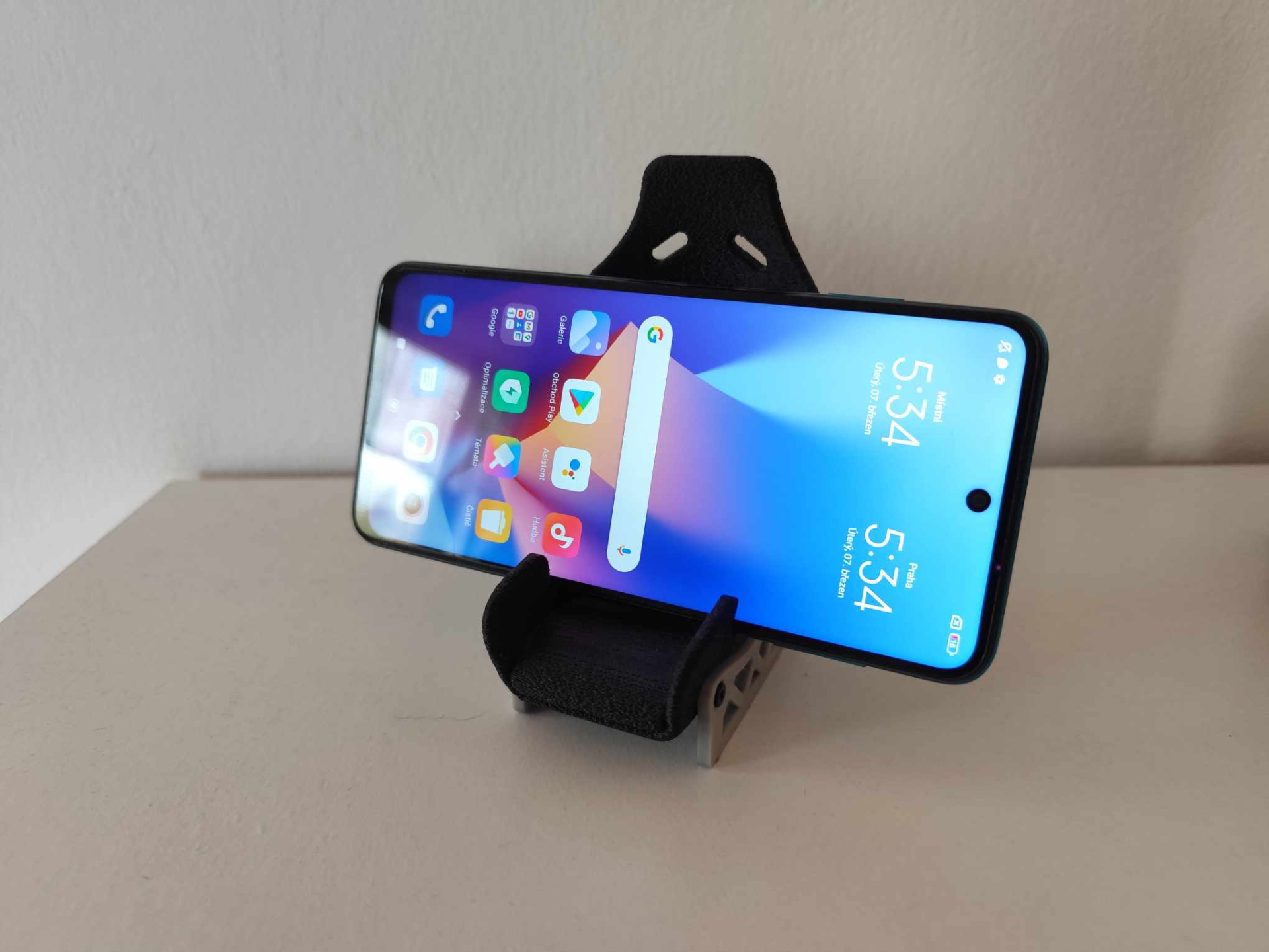 Racing seat phone stand