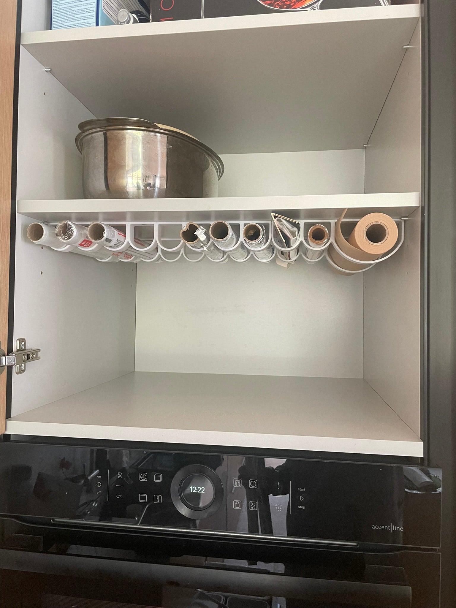 Rolls of kitchen foil and film organizer